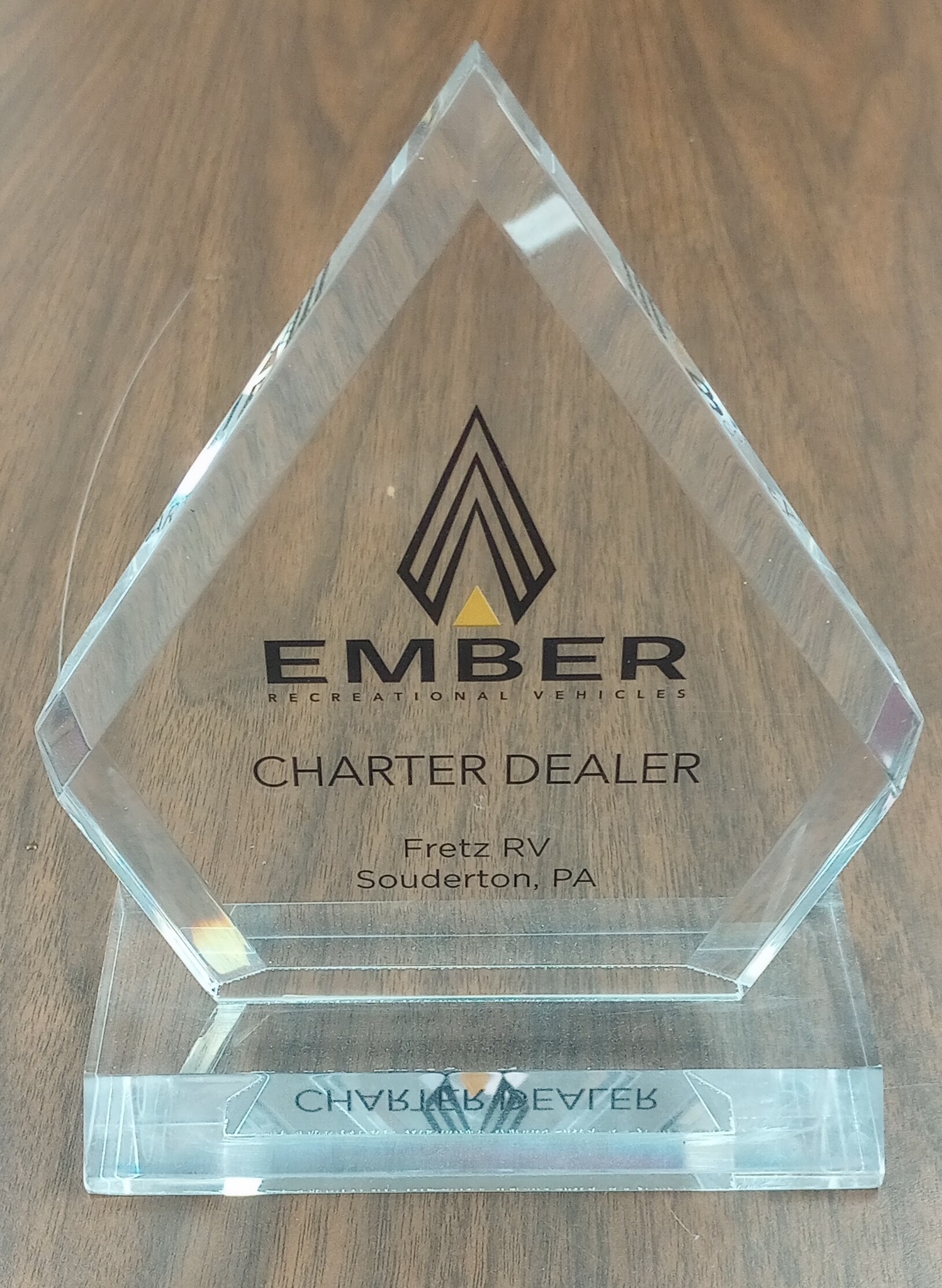Fretz RV team accepting the Ember RV Charter Dealer Award