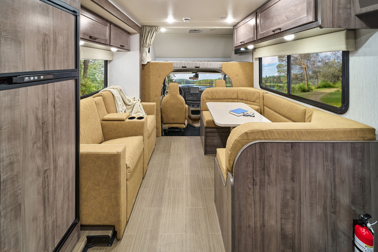 Comfortable living area with sofa in the 2026 Winnebago Minnie Winnie National Park Edition