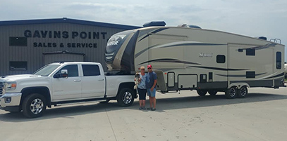 A truck pulling an RV