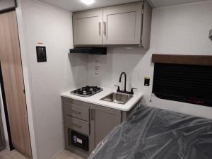 Hideout Mini 130BH Photo