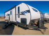 Front angled exterior view of the 2023 Forest River Salem 26RBSX travel trailer with aerodynamic front cap design.