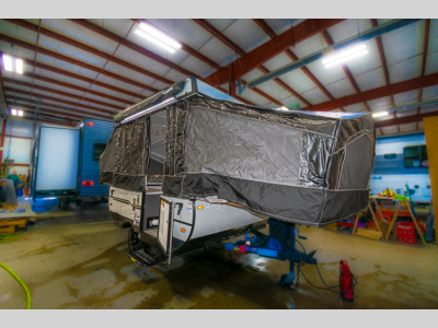 Exterior Front View: Front view of the pop-up RV showcasing its sleek design.