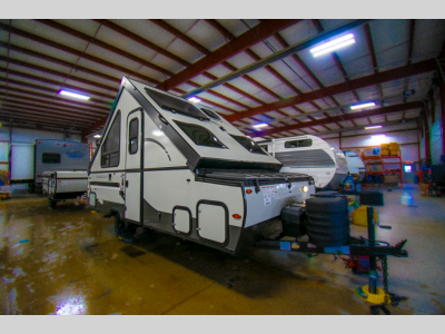 Front Exterior View: Sleek front design of the pop-up camper, emphasizing its compact build.