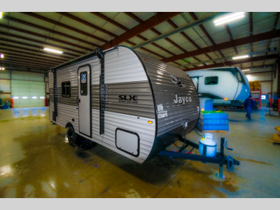 Front exterior view of the 2025 Jayco Jay Flight SLX 170FQ showcasing its aerodynamic design and durable aluminum siding.