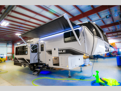 Front exterior of the 2025 Jayco Eagle HT 29RLC with LED lights and aerodynamic design