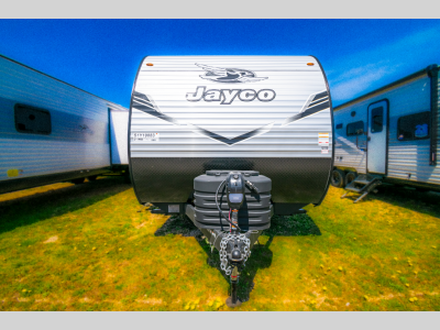 Close-up of the front end showing the Jay Flight logo, propane tanks, and electric tongue jack.