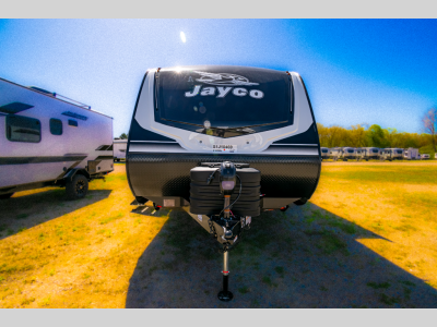 Head-on shot of the aerodynamic front cap with Jayco logo and rock guard protection.