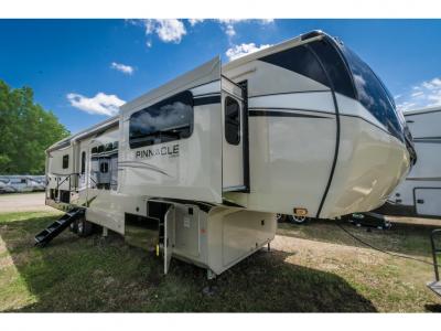 Side exterior showcasing slide-outs and awning