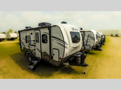 Side profile of the Forest River RV showcasing its aerodynamic design and modern features.