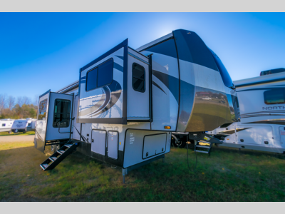 Front angled exterior view of the 2022 Forest River RV Sandpiper Luxury 391FLRB.