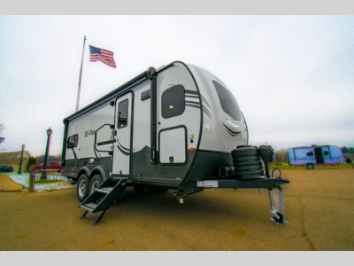 Side exterior view of the RV with modern design.