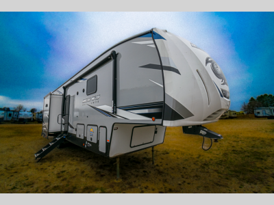 Angled front exterior view of the 2022 Forest River Cherokee Arctic Wolf Suite 3770.