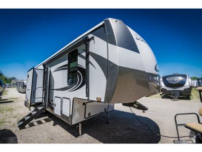 Front Exterior: 2023 Forest River Sandpiper 3440BH fifth wheel with modern aerodynamic design and dual-axle setup.