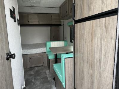 Dinette seating and bunk area