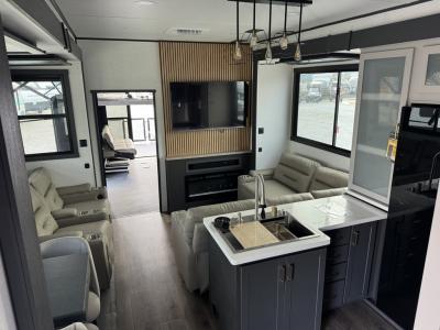 Spacious living area and island kitchen with panoramic windows