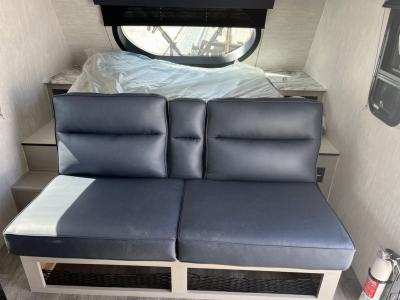 Murphy bed stored for seating area.