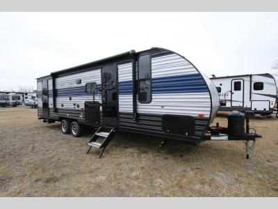 New Grey Wolf RV With Mounted Propane Tank and Awning