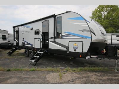 New RV With Awning and Mounted Propane Tank