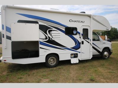 Used Motor Coach With Awning and Outdoor Storage