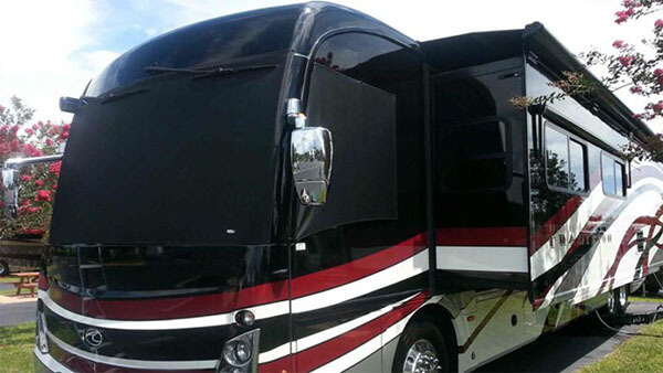RV exterior with covers in the windows