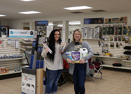 Parts Specialist showing customer RV tail lights product