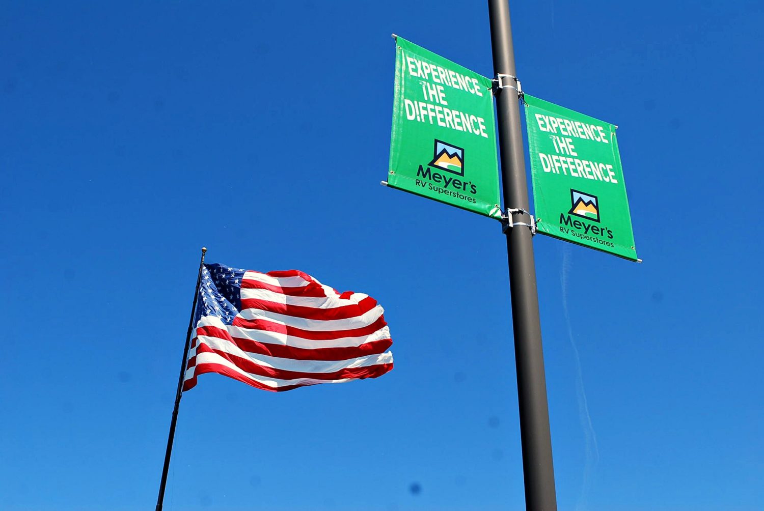 flag pole and meyers signs