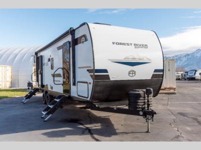 Front passenger side view of 2025 Forest River Surveyor Legend X 29CAMP travel trailer for sale