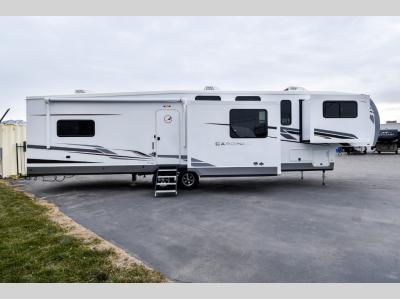 Street-side profile with slideouts open and extended patio awning