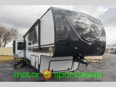 Angled front view of 2025 East to West Ahara 395FB fifth wheel at Motor Sportsland