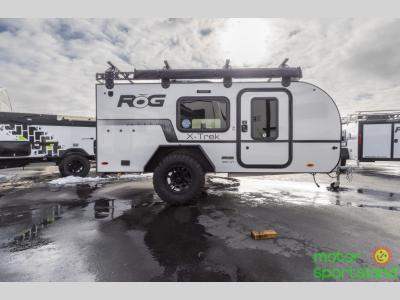 Passenger side profile showing rugged tires and entry door