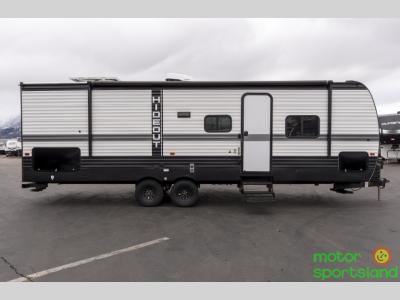 Full side profile of Hideout Sport 269DB with entry door