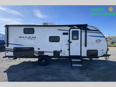 Passenger side view showing entry door and power awning