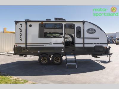 Passenger side of this Forest River trailer for sale