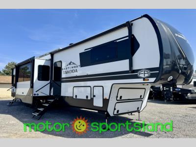 Front cap view of the 2025 East to West Takoda 400TH fifth wheel toy hauler for sale at Motor Sportsland