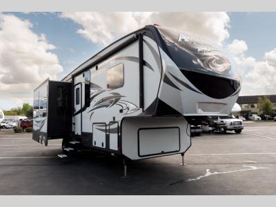 Exterior Door Side from the front corner of the Keystone RV Avalanche 300RE