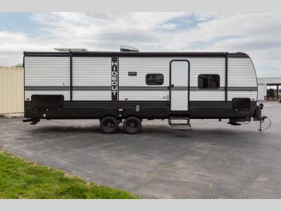 Street side slide-out and full-length awning on the Hideout Sport travel trailer
