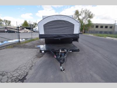 Front view showing tent bed extended and hitch jack below