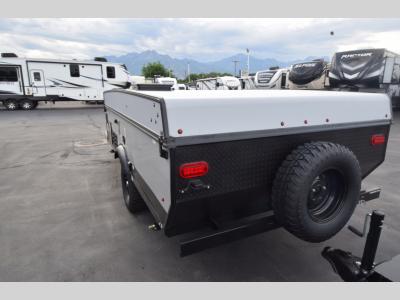 Rear corner view with spare tire and taillights mounted