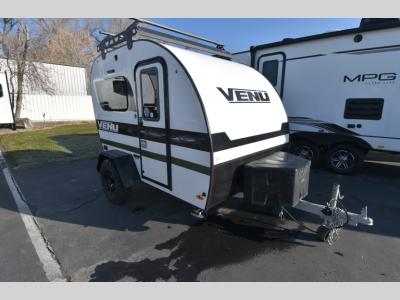 Angled front-left view of 2024 Encore Venu 10KB travel trailer