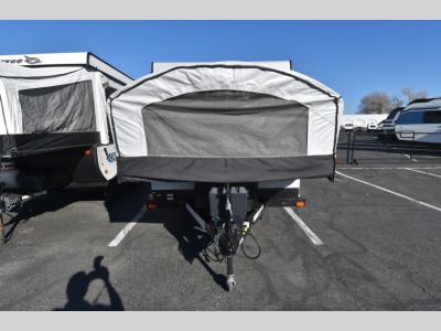 Front tent bed extended with vinyl canvas and hitch frame