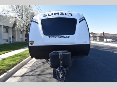 Front view showing aerodynamic fiberglass cap and triple propane tanks
