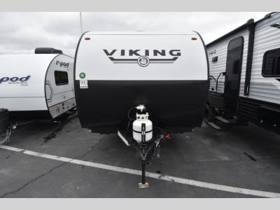 Front view showing aerodynamic nose cap and propane tanks
