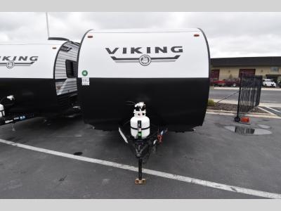 Front close-up showing aerodynamic front cap and propane tanks