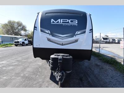 Front view with smooth fiberglass cap and dual propane tanks