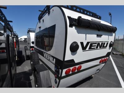 Rear view showing bold VENÚ branding and storage hatch
