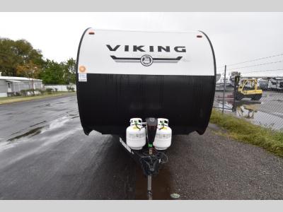 Front hitch and dual propane tanks on Viking 262BHS bunkhouse trailer