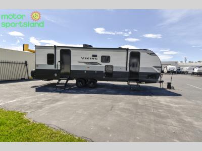 Side profile of Viking 6K Series trailer showing awning and entry door
