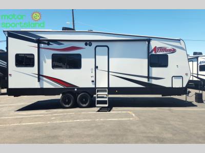 Full curbside view showing awning and side entry door