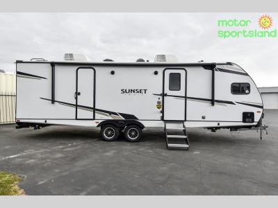 Full passenger side profile with entry door, slide, and awning