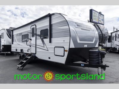 Front angle view of 2024 Winnebago Access 25ML parked on paved lot